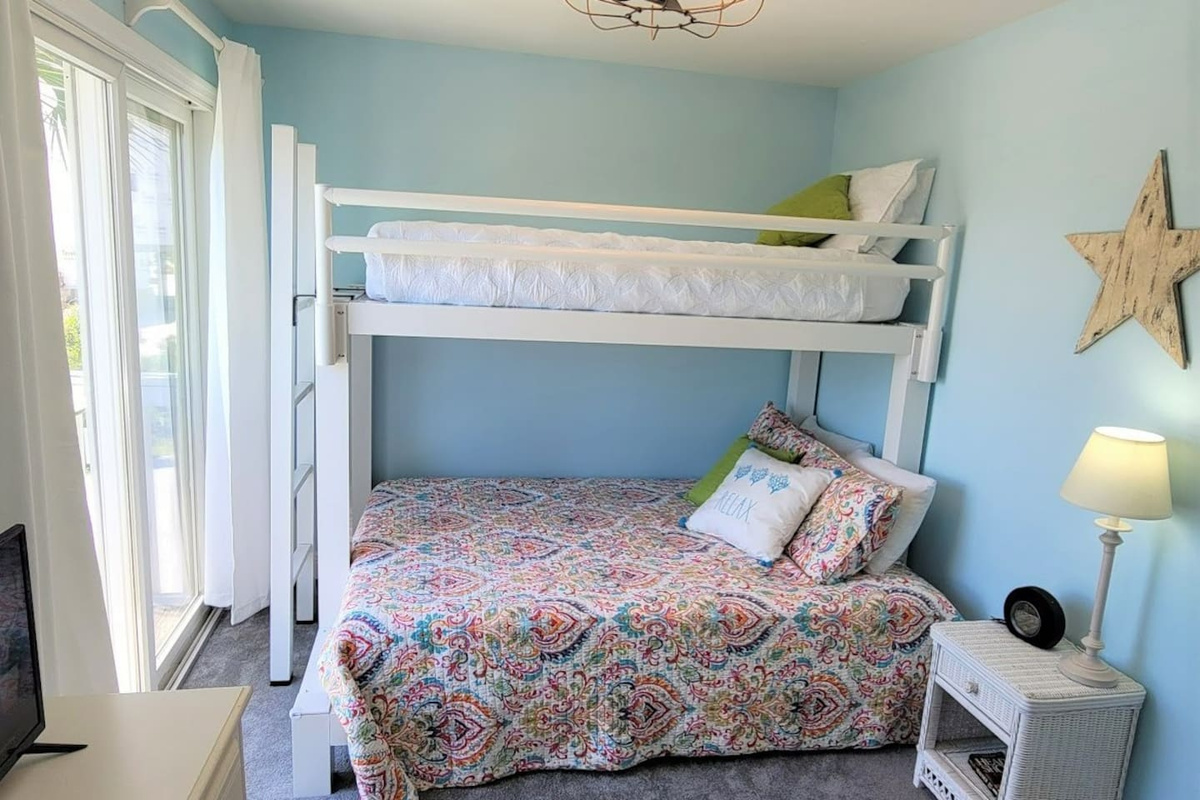 Kids call the top bunk, parents relax &mdash; the twin-over-queen bunk on the main level keeps everyone comfortable.