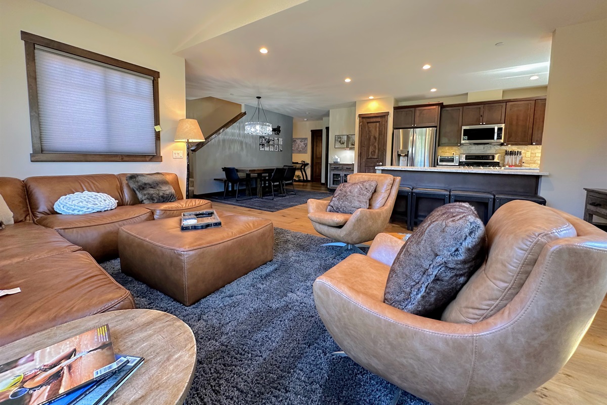 The open living, dining, and kitchen layout means everyone can hang out together—whether you're cooking, chilling, or conquering board game night.