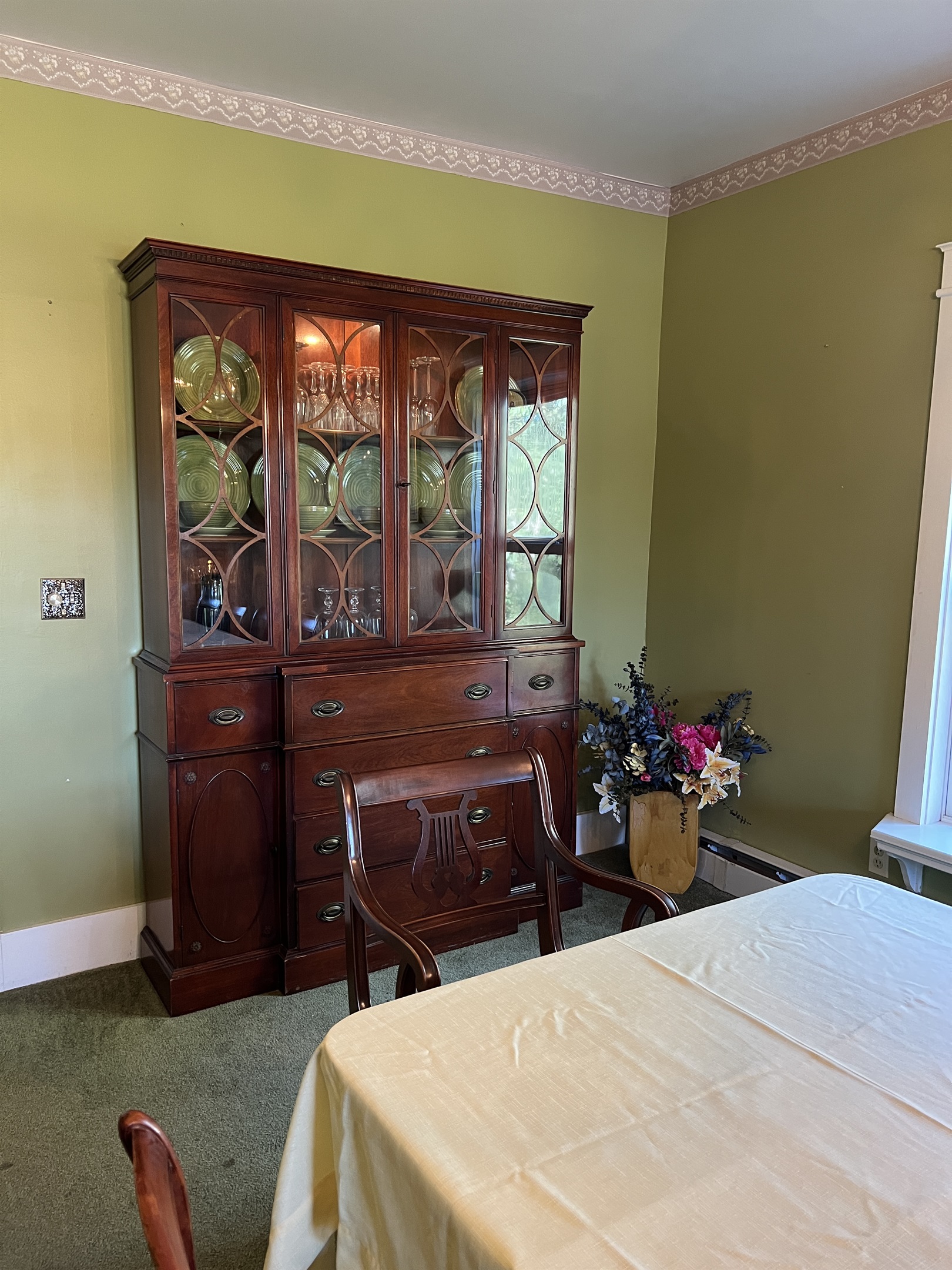 Dandelion main dining room china cabinet.