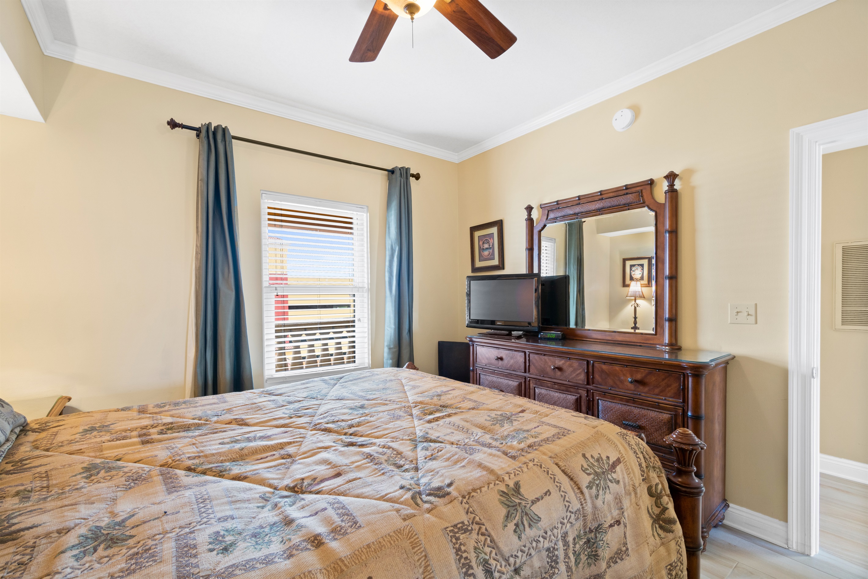 Queen bedroom with tv