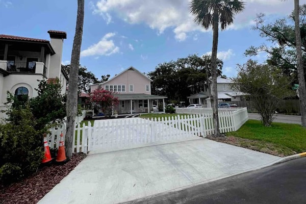New driveway, can fit up to 6 vehicles with the gate open. 
