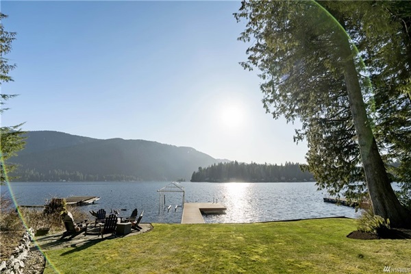 Relax on the back porch and take in the serene lake vista.