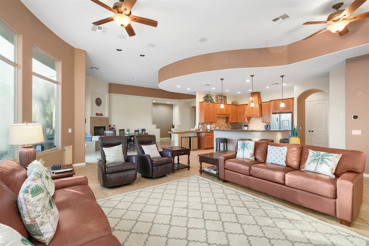 Open living space seamlessly connecting the living room, kitchen, and dining area