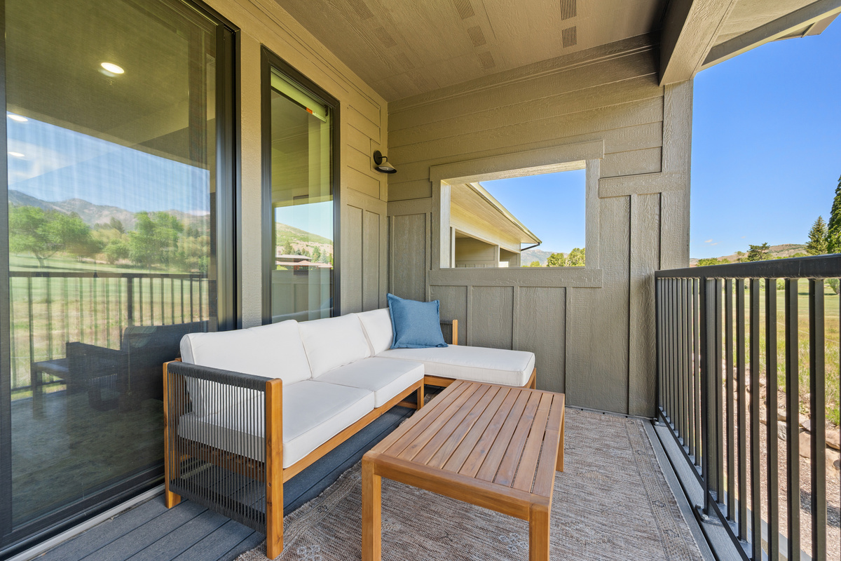 Relax on the covered deck and enjoy the fresh mountain air.
