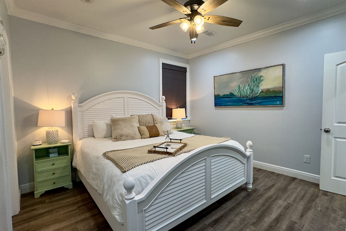 Drift into comfort in this serene, coastal-inspired bedroom.