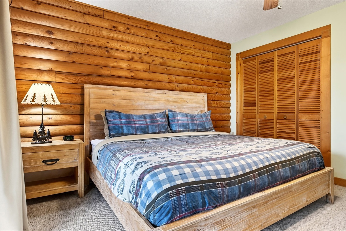 Main level bedroom with king bed