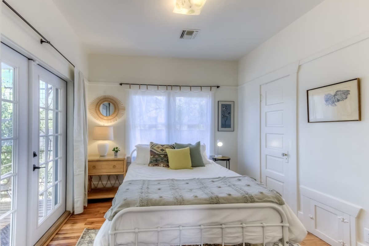 back bedroom with French doors to back patio
