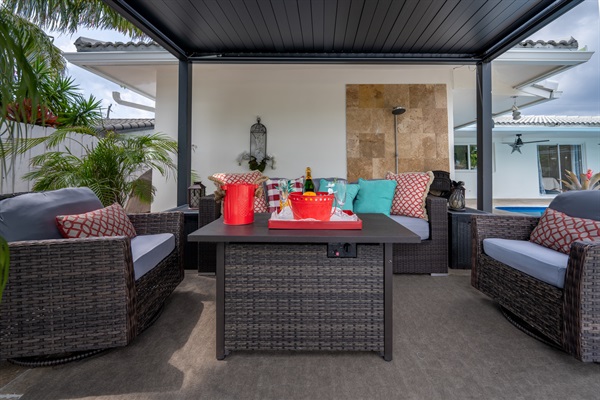 Covered outdoor lounge perfect for relaxing by the pool