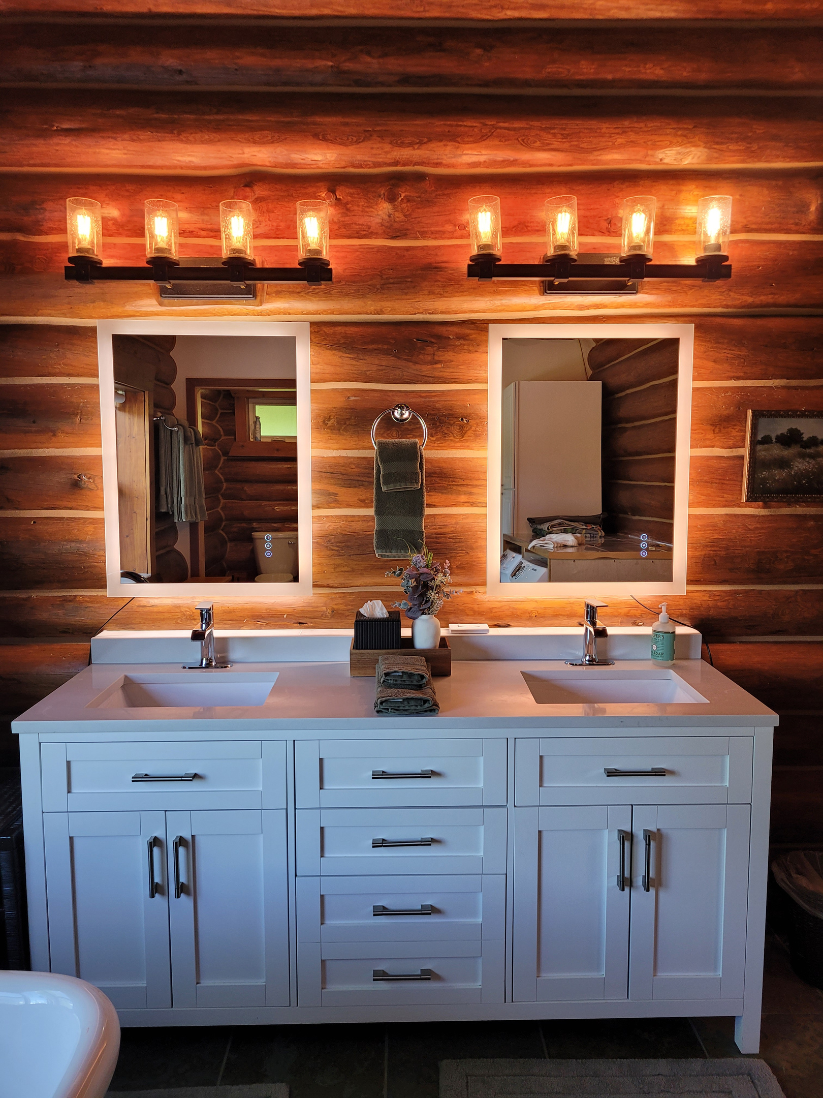 Modern vanity for two, with "in case you forgot" essentials below.