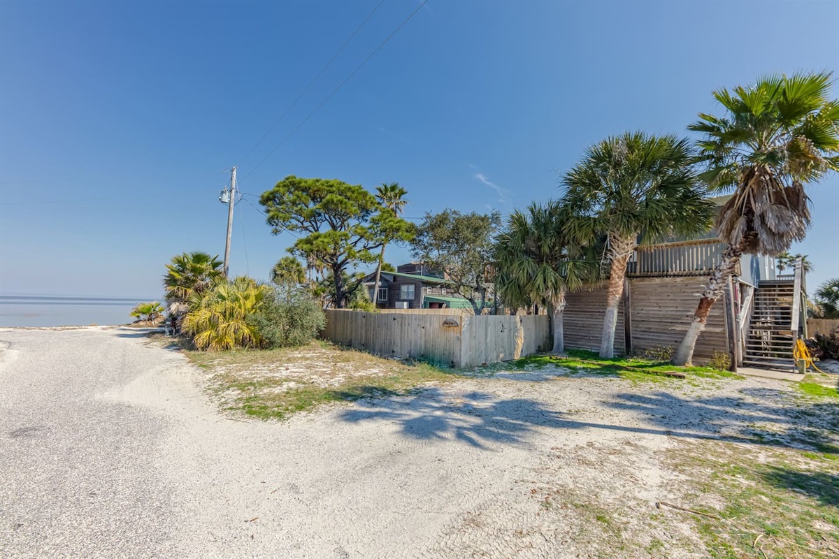 Outdoor Oasis: Step into paradise with palm trees and stunning coastal views just outside your door!