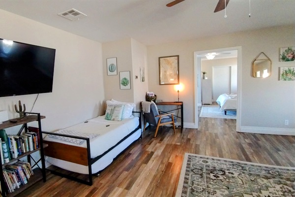 Two twin beds, work space and smart TV