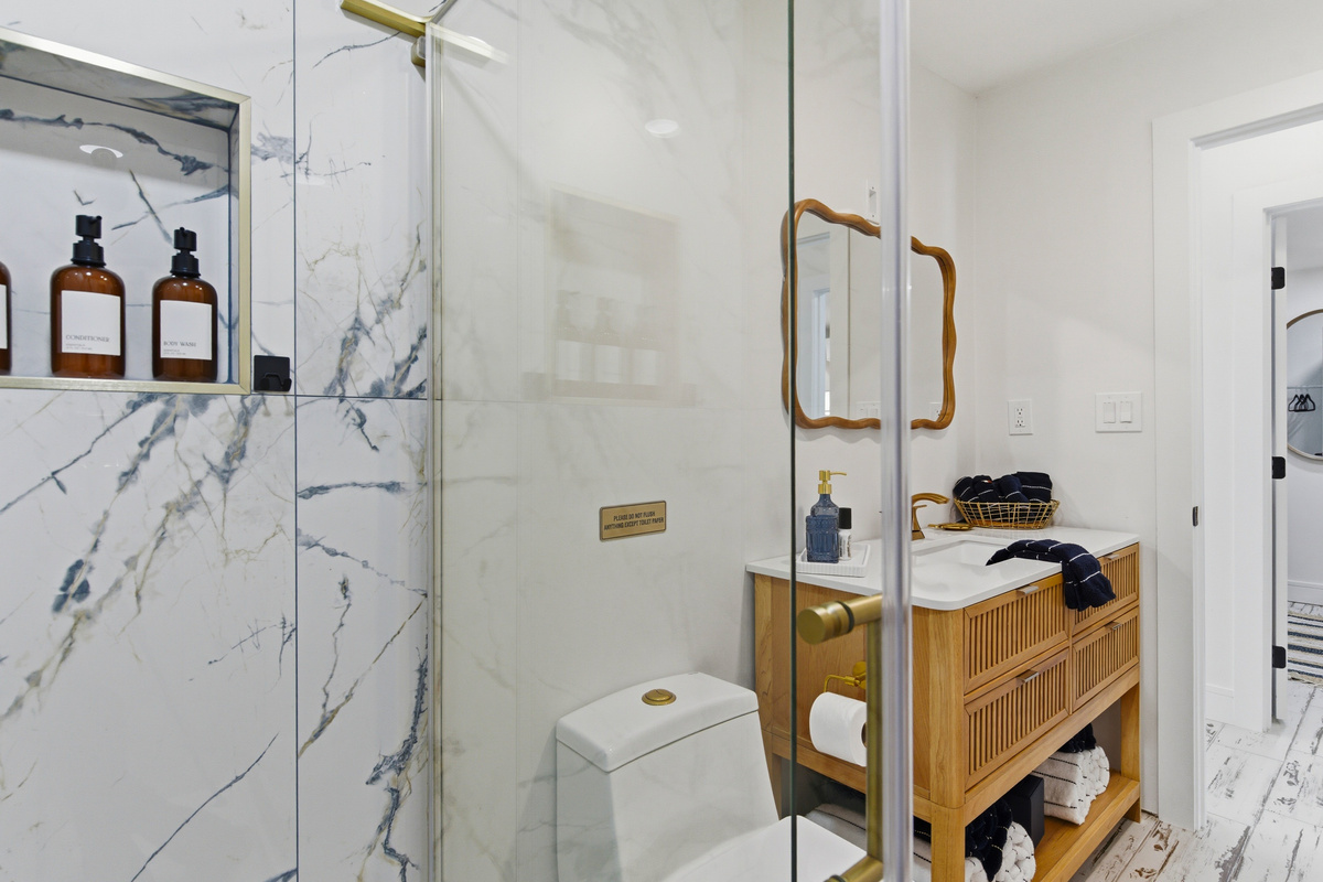 The Hallway bathroom is between Bedroom 2 & 3 with shampoo and conditioner and lots of towels provided.