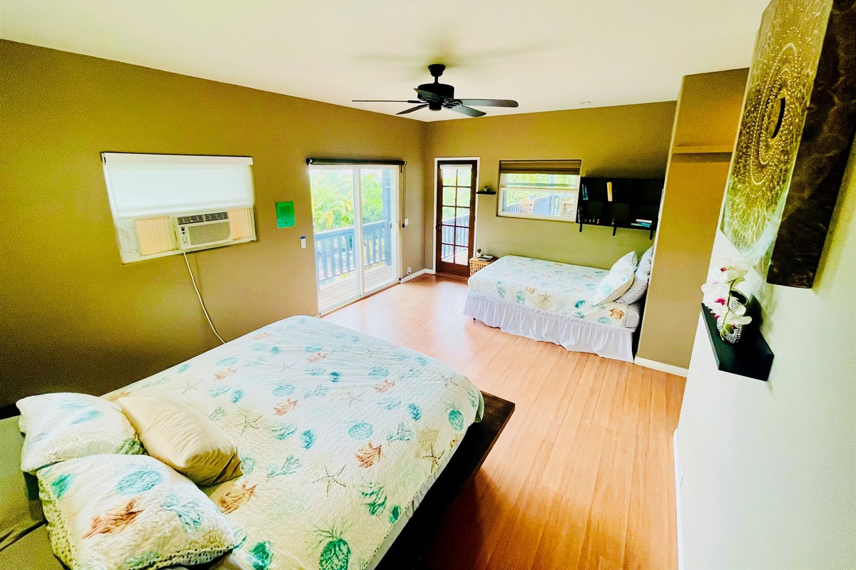 Bedroom 1 with one king bed and one twin bed