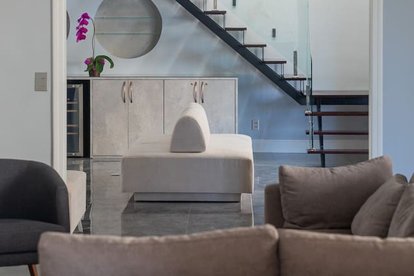 Two bedrooms and bathrooms on upper floor accessed by this modern staircase.  All other rooms are on main floor of penthouse -- the 11th floor -- with two elevators from ground.  We have the entire 11th floor and upper floor. 