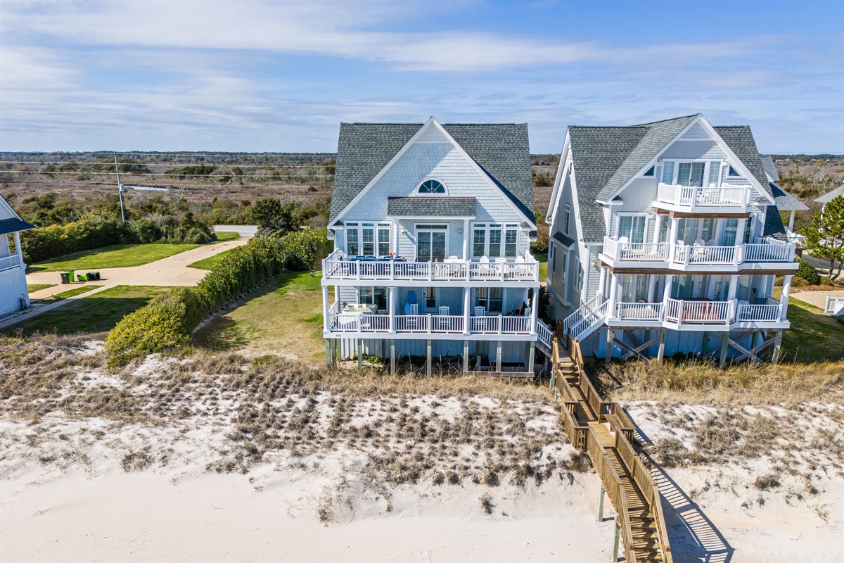 Watch the sunset over the dunes from your multiple private balconies.