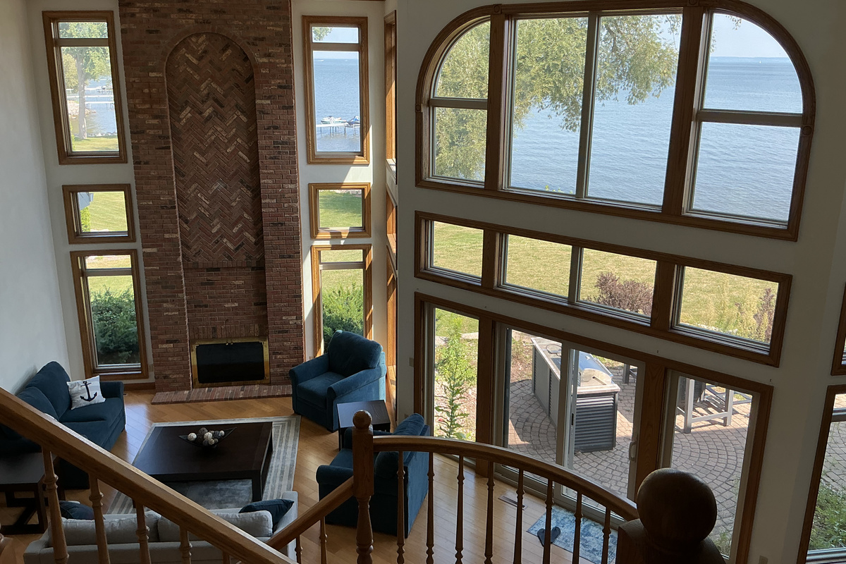 Great room view from one of two sets of staircases in home to upper level