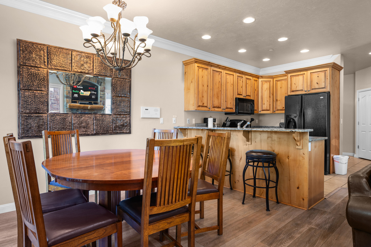 Dining area with seating for family meals, game nights, and memorable conversations.