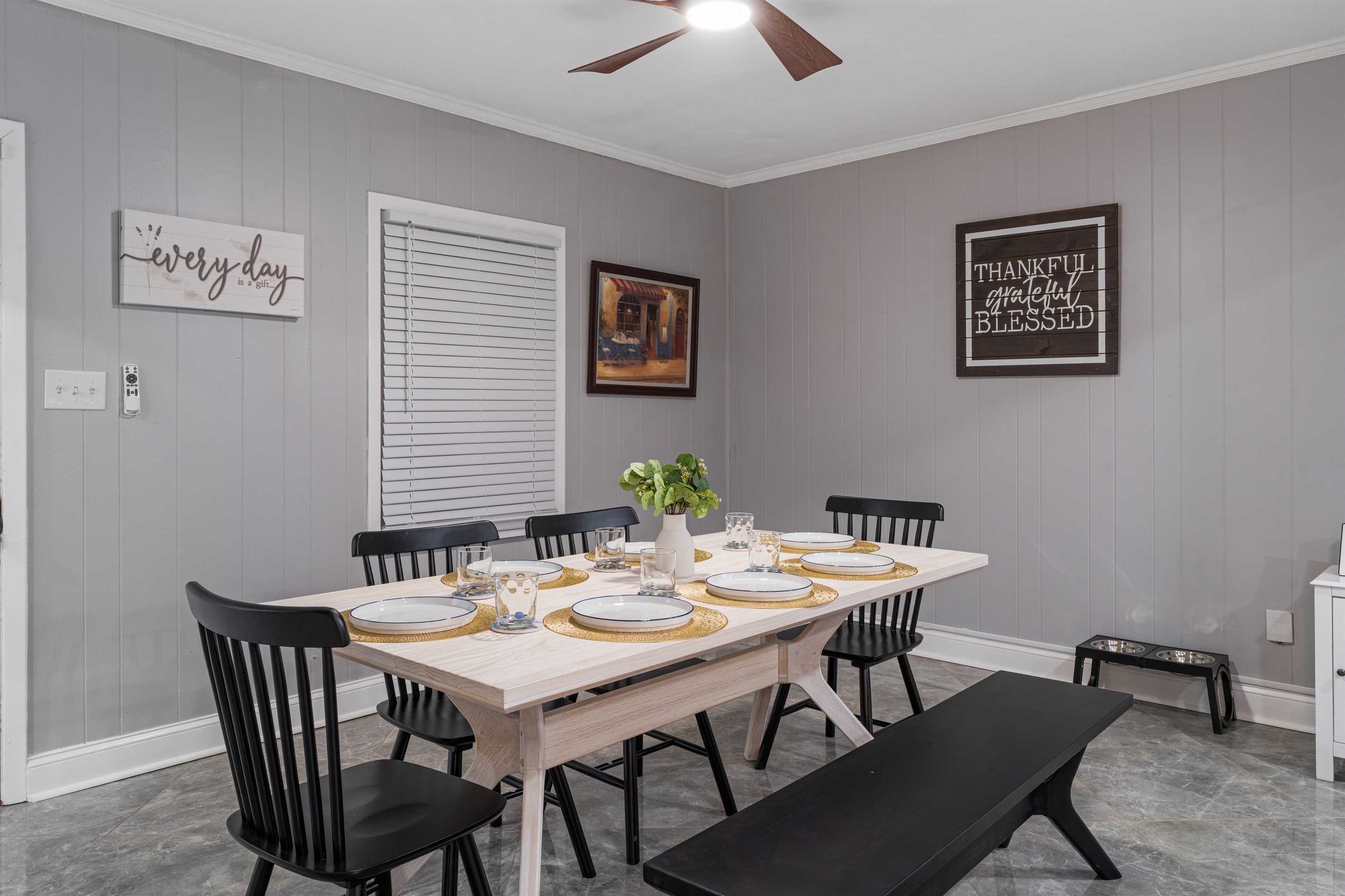 Enjoy meals, morning coffee, or late-night chats in this cozy dining room equipped with a TV for added comfort and entertainment.