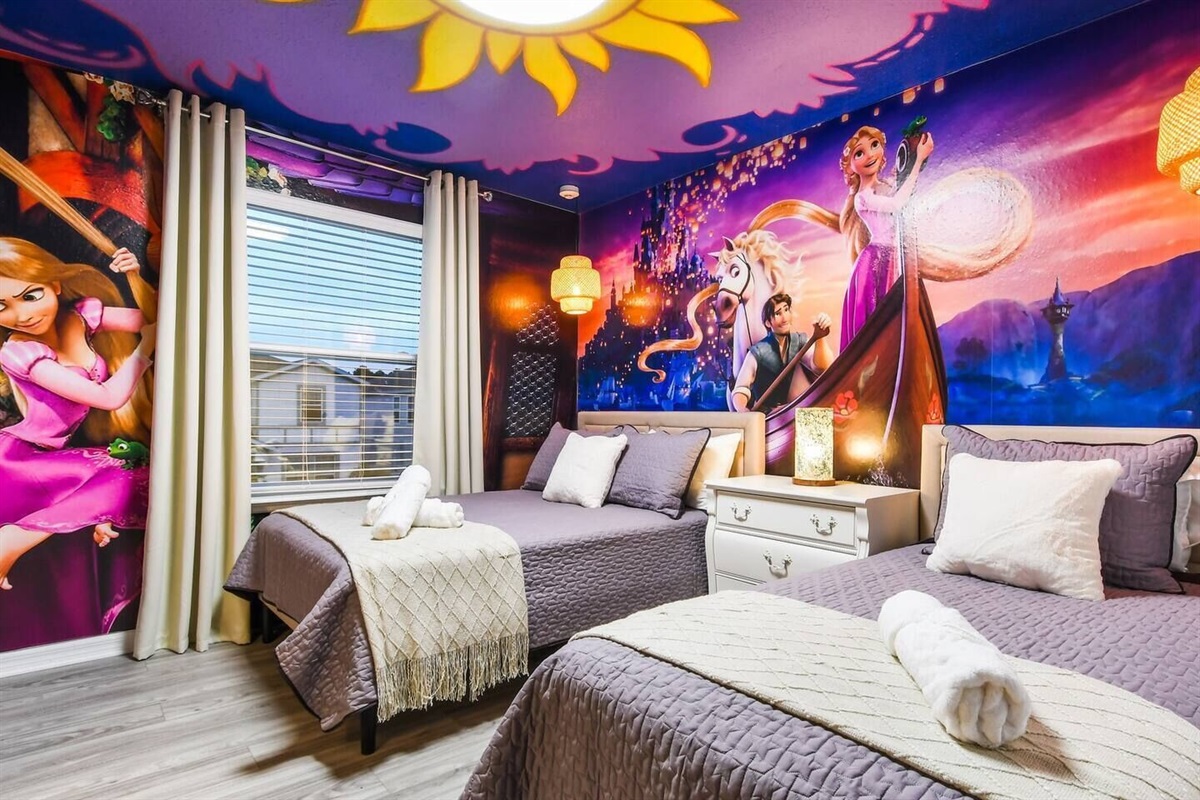 Inspired by Rapunzel’s story, this lovely themed room shares a Jack-and-Jill bathroom with the King Pink Bedroom. Includes a smart TV.