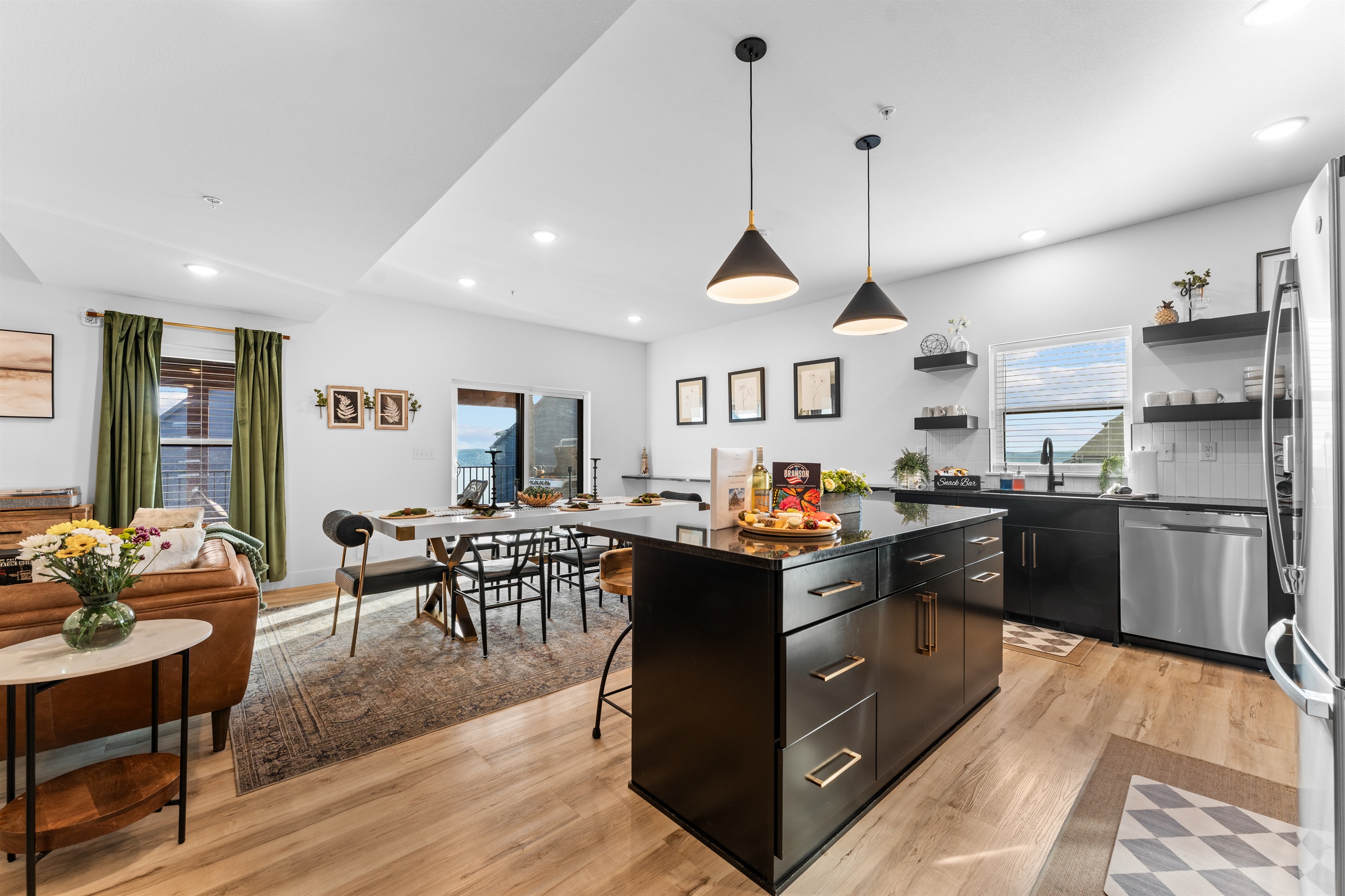 Kitchen, indoor and outdoor dining are all connected