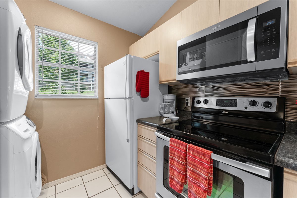 The kitchen includes the practical extras that make a shorter getaway or longer stay feel easy.