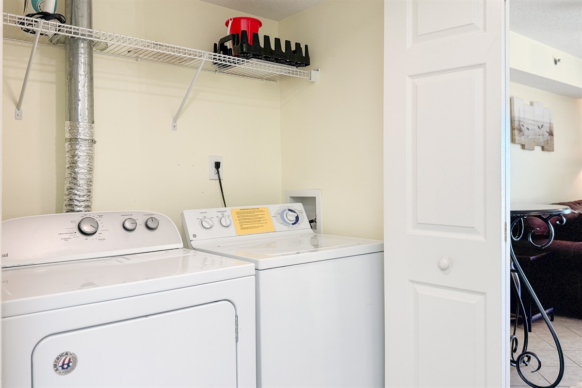 This well-equipped utility closet offers ample storage and a in-unit washer/dryer for your everyday needs.