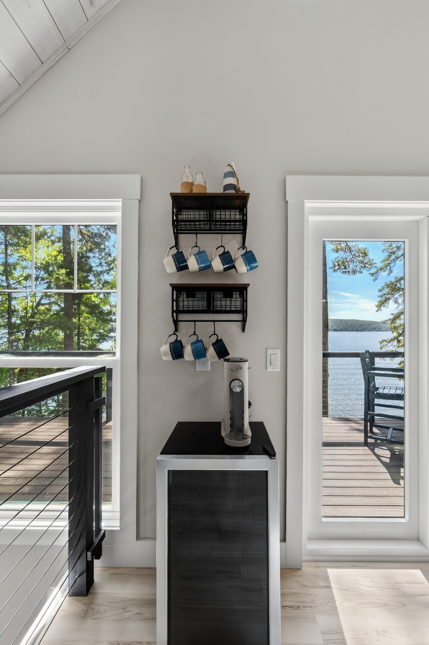 Make your coffee upstairs, step onto the balcony, and start the morning with Great East Lake in front of you. ☕