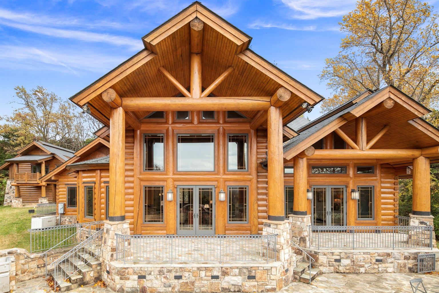 Covered rear patio with high windows, massive room for get-togethers