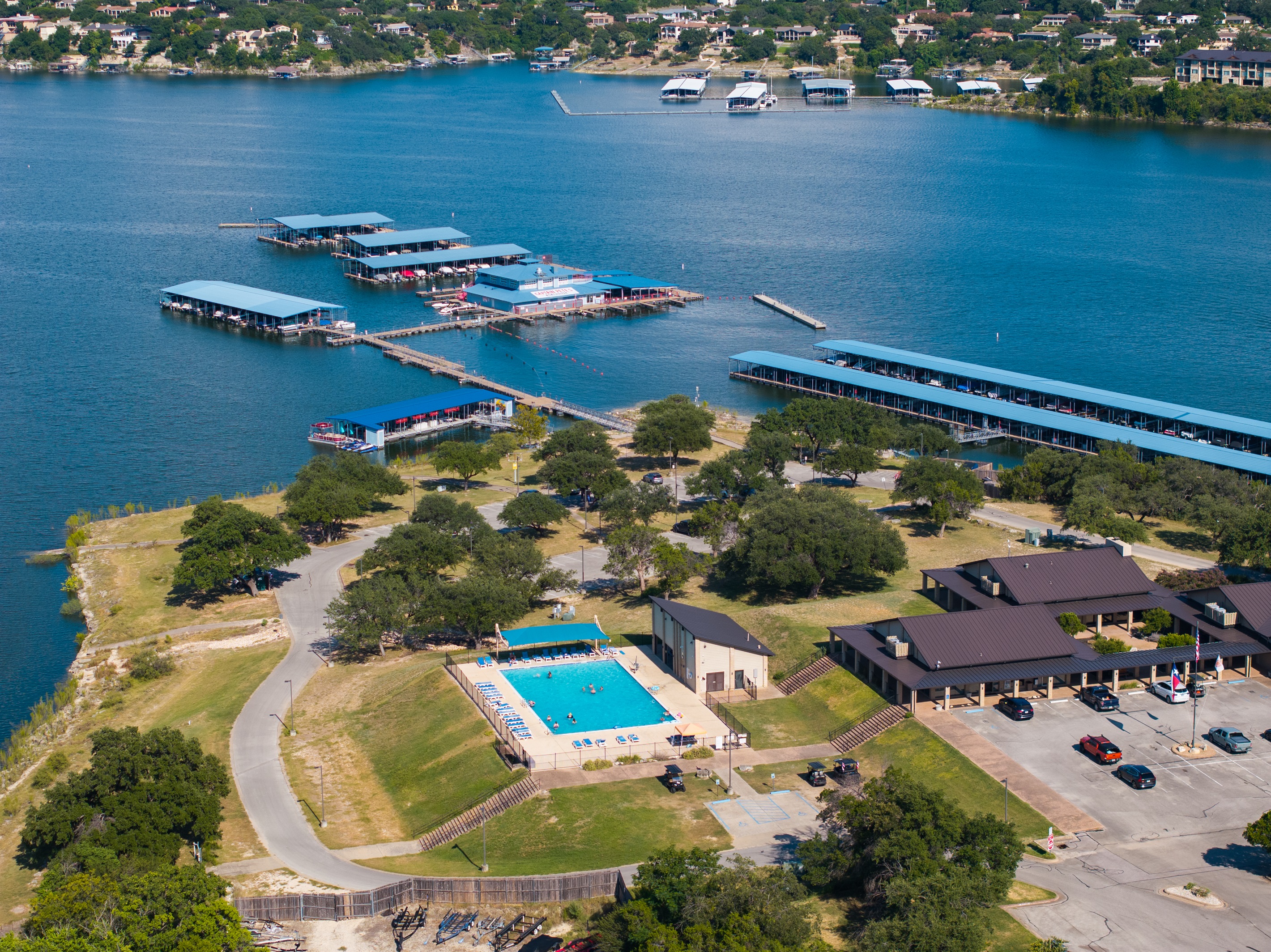 Junior Olympic-size pool located next to the gym and library, just up the hill from Captain Pete’s floating restaurant. Guest key card required for access.