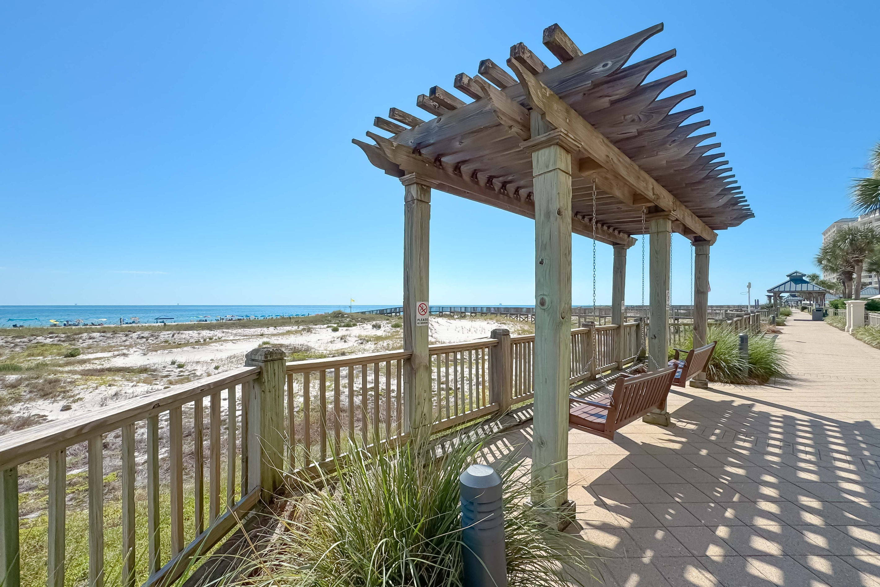 Imagine yourself here... swaying gently with the ocean breeze and soaking in this incredible view. What's your favorite way to relax by the sea?