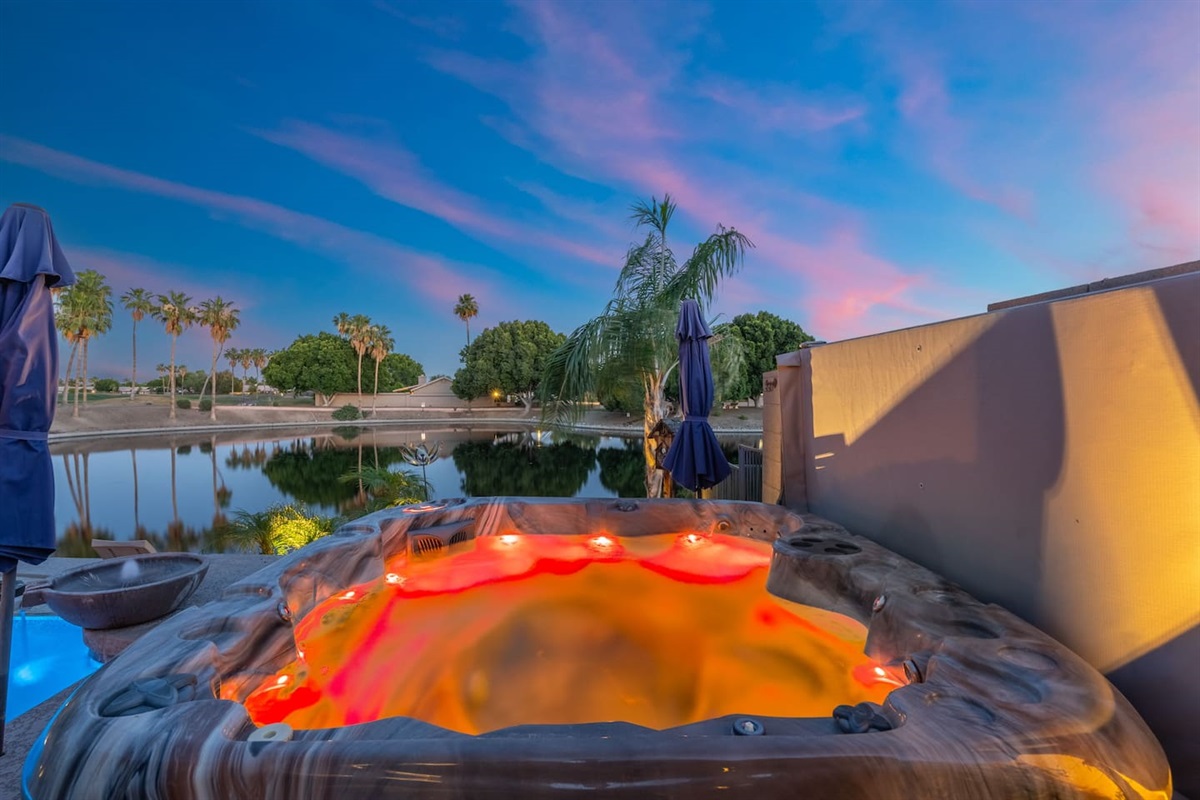 Sink into the hot tub as the sky turns cotton candy pink and the lake goes glassy still — this is the kind of evening that makes you completely lose track of time.