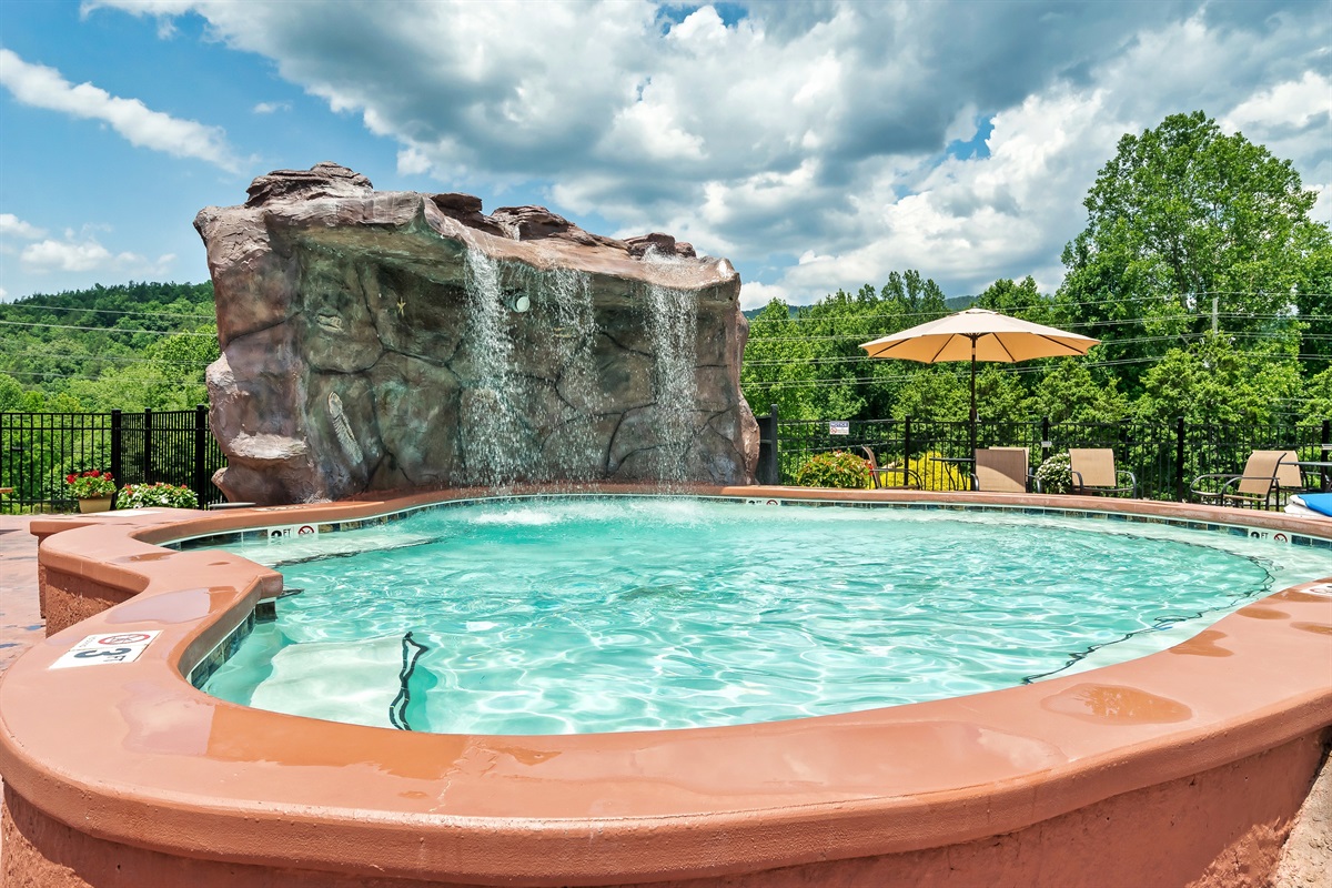 Enjoy the resort's saltwater pool with waterfall!