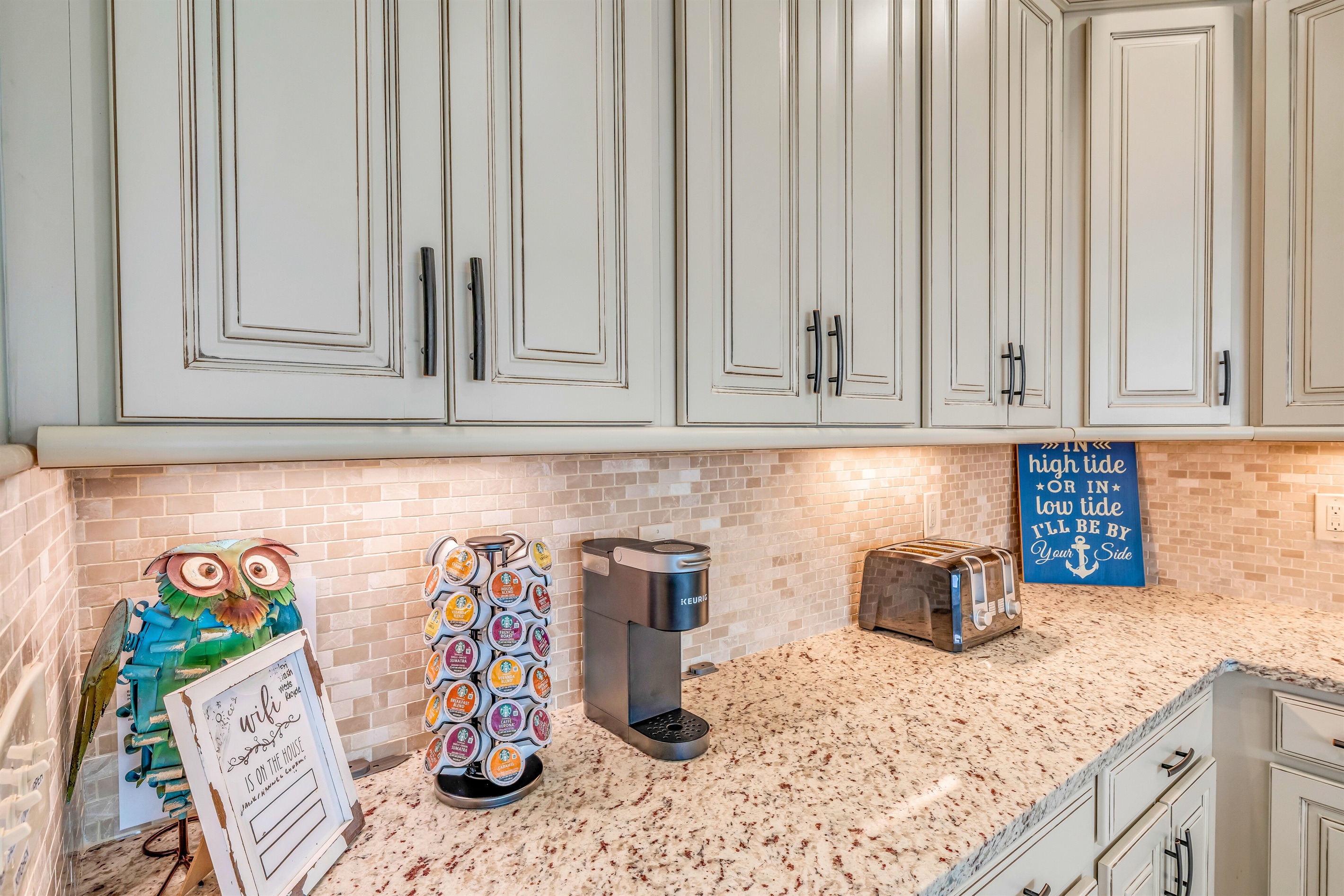 A Keurig Coffee Maker & An Assortment of K Cups On Us