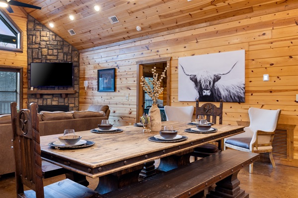 Dining Area with 2 benches and two chairs, seats up to 10