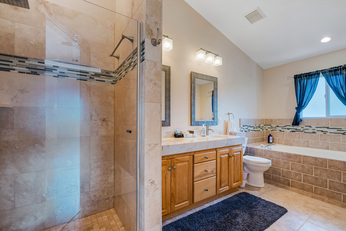 Enjoy the space of a true master bathroom