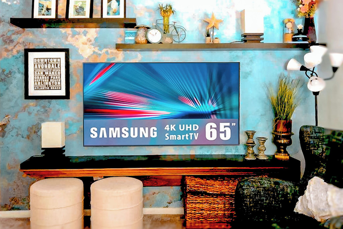 This new 65” TV takes center stage as you enter the living room area.  
