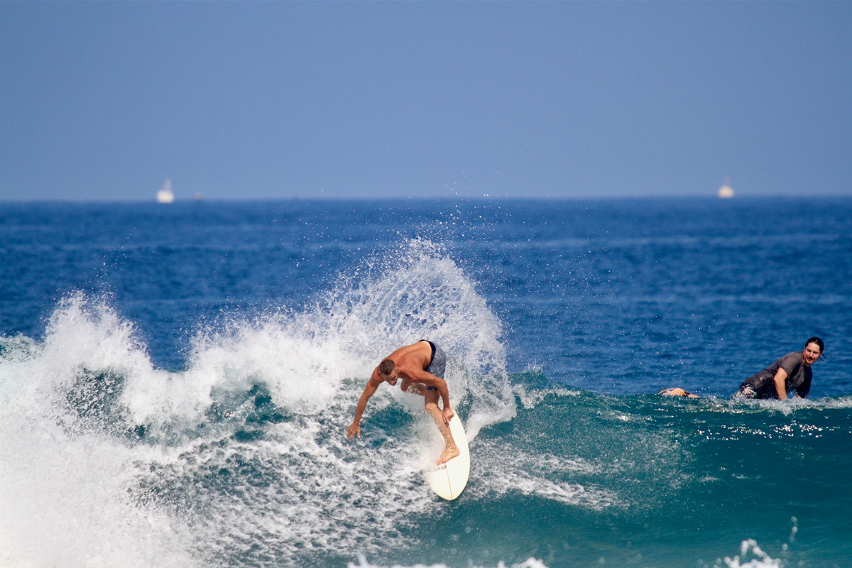 Watching surfers from the deck