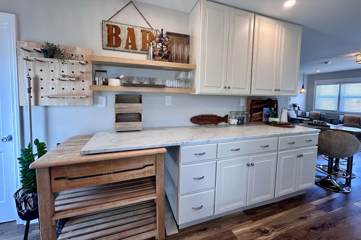 Bar with rolling cutting board