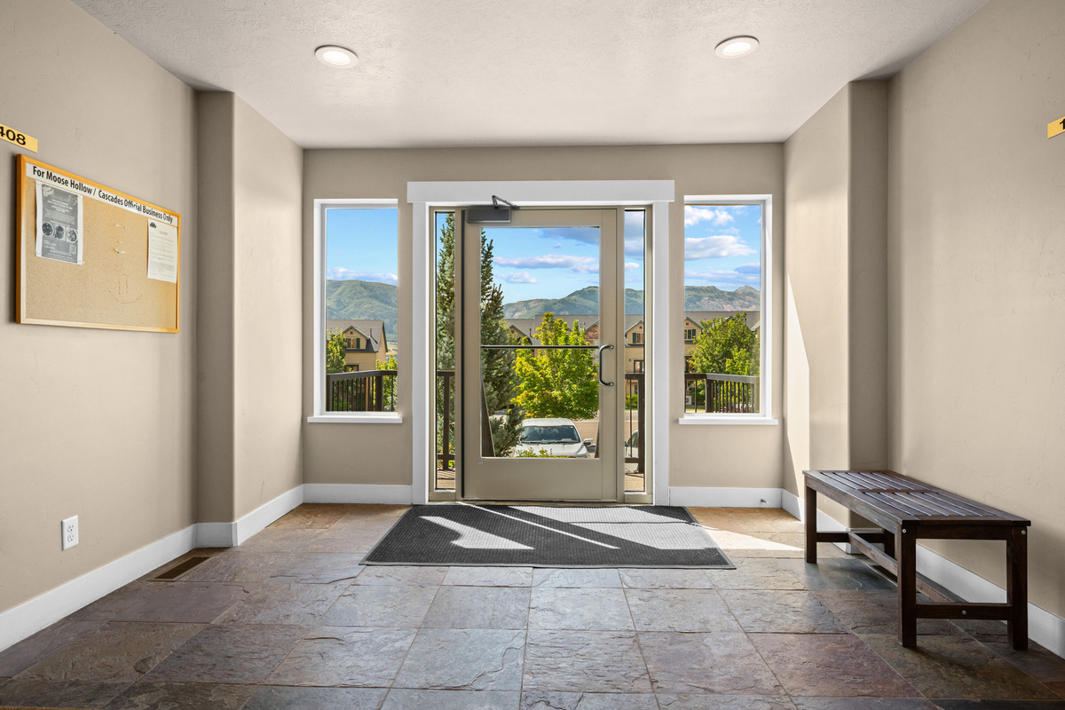 A bright common entry creates a comfortable arrival experience before you settle into your stay.
