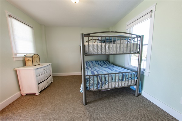 Smart, stylish, and space-saving — this bunk bed setup keeps comfort in mind.