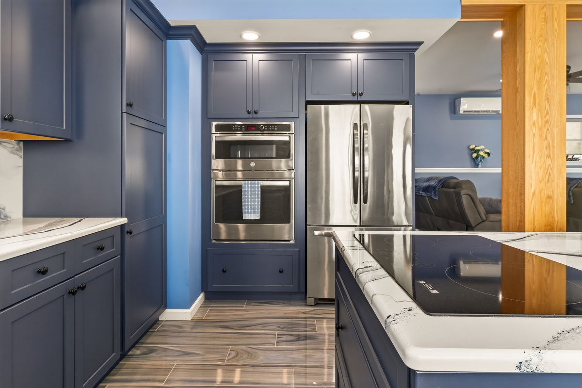 Kitchen with stainless appliances and peninsula seating
