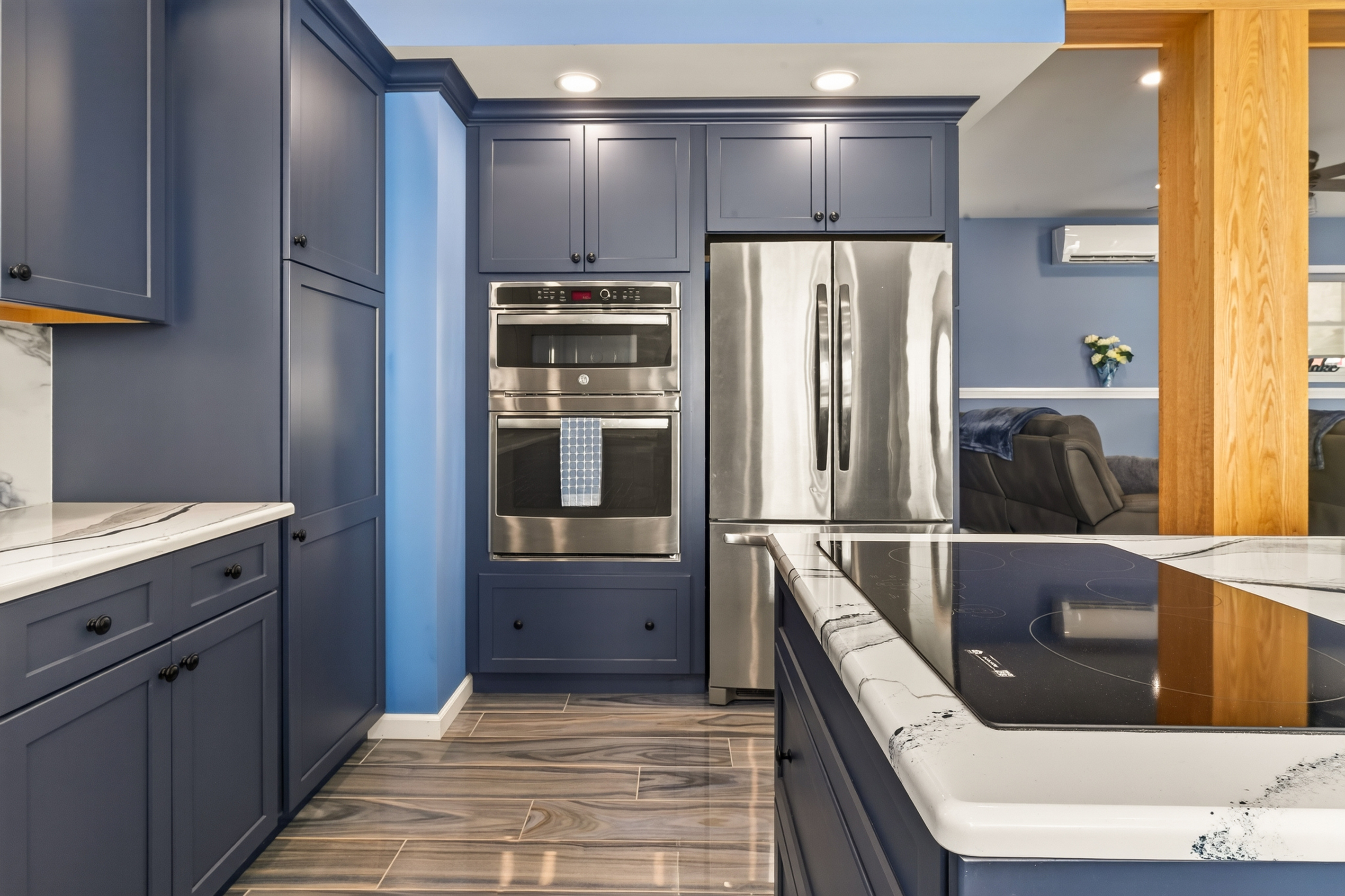 Kitchen with stainless appliances and peninsula seating