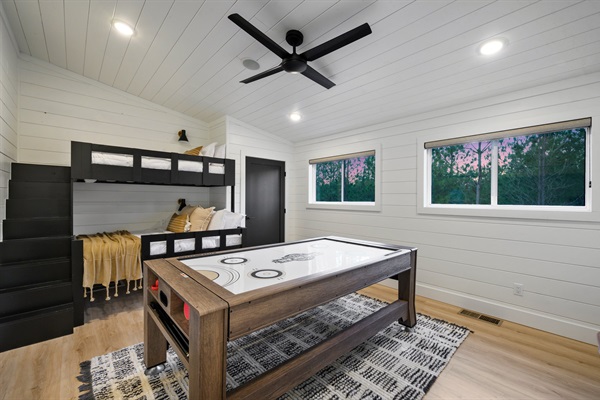 The spacious loft features built-in bunk beds and a full-size game table for endless entertainment.