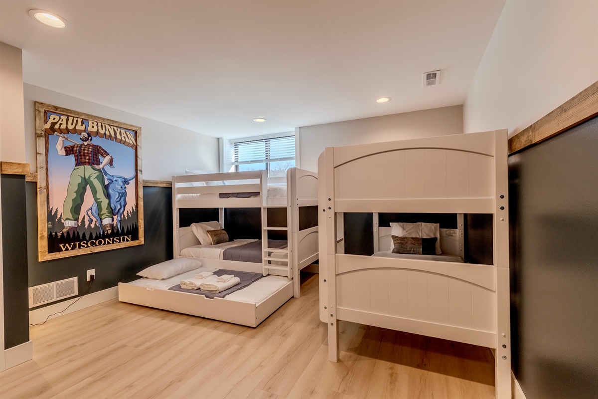 Bunk room that sleeps five total and has a Roku TV.