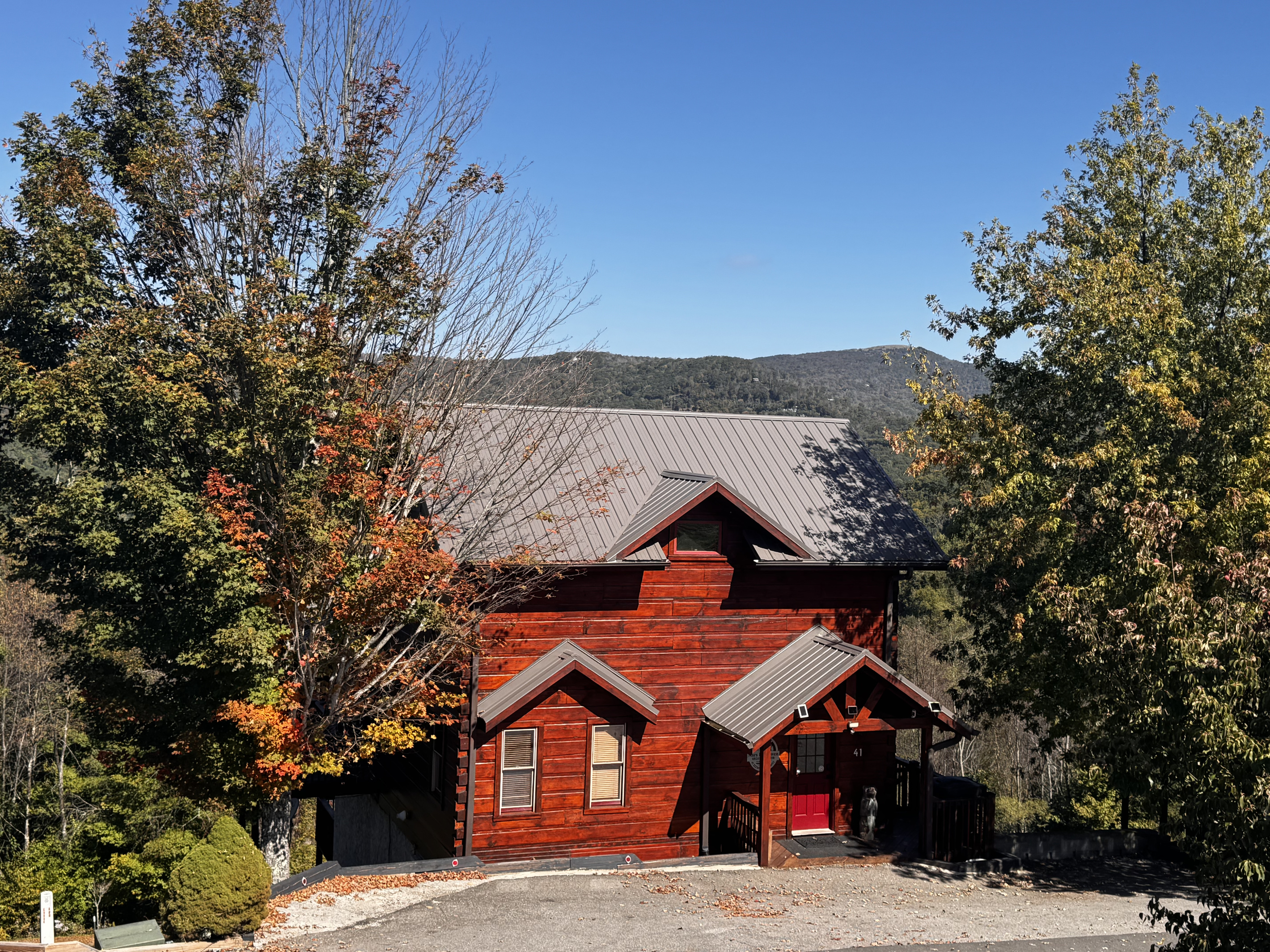 Welcome to Mars Hill Haven, a three-story log cabin in the Scenic Wolf mountain community near Hatley Pointe.