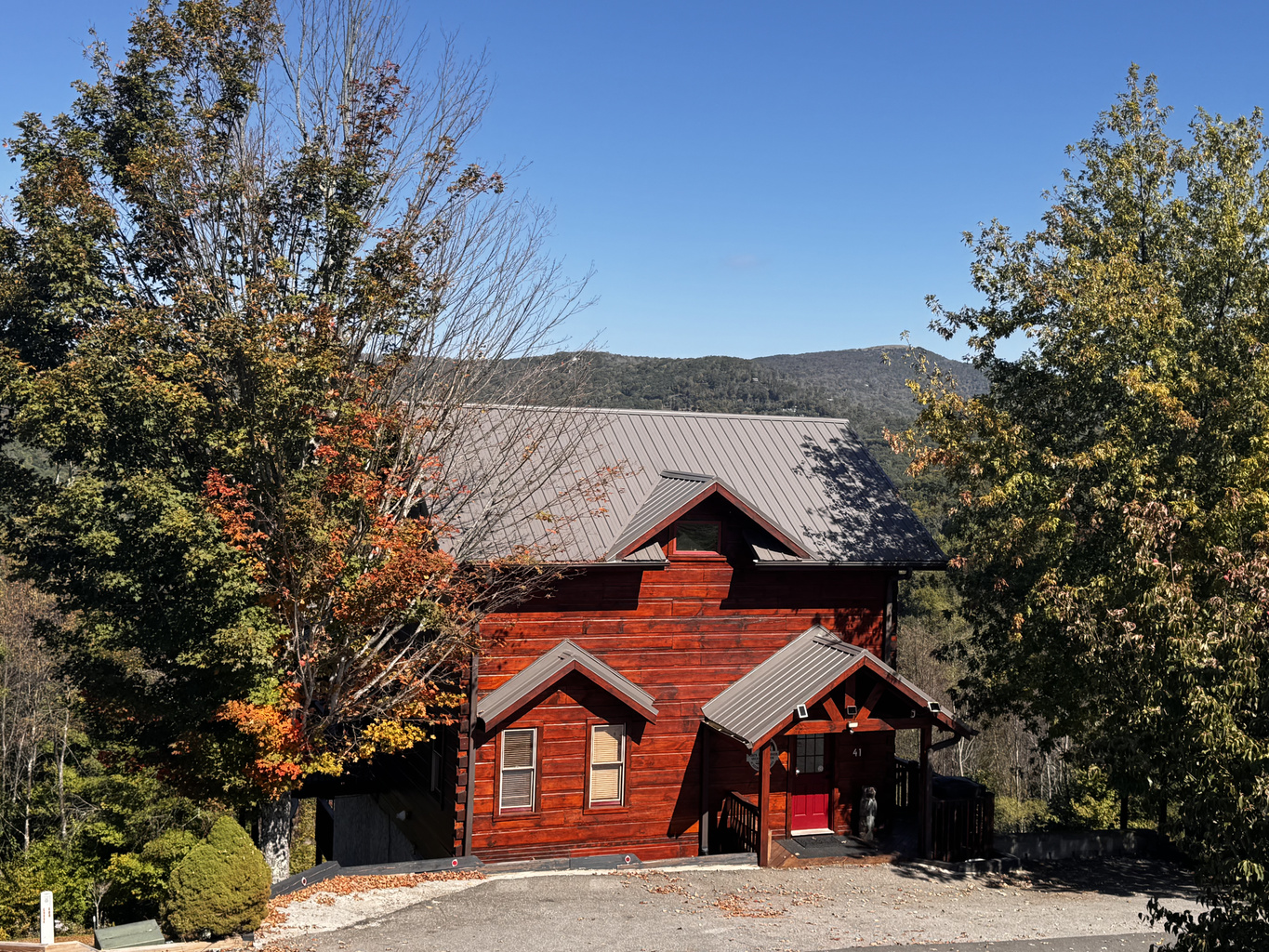 Mars Hill Haven, our three-story log cabin in the Scenic Wolf mountain community