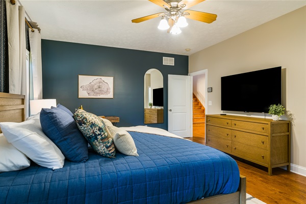 Relax into plush bedding, layered pillows, and calming colors — a peaceful place to recharge.