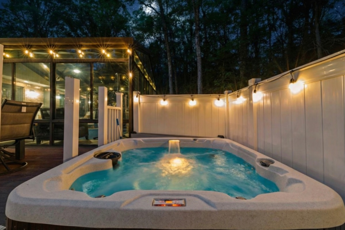 Soak away your worries in your own private fenced-in hot tub, right off of the deck