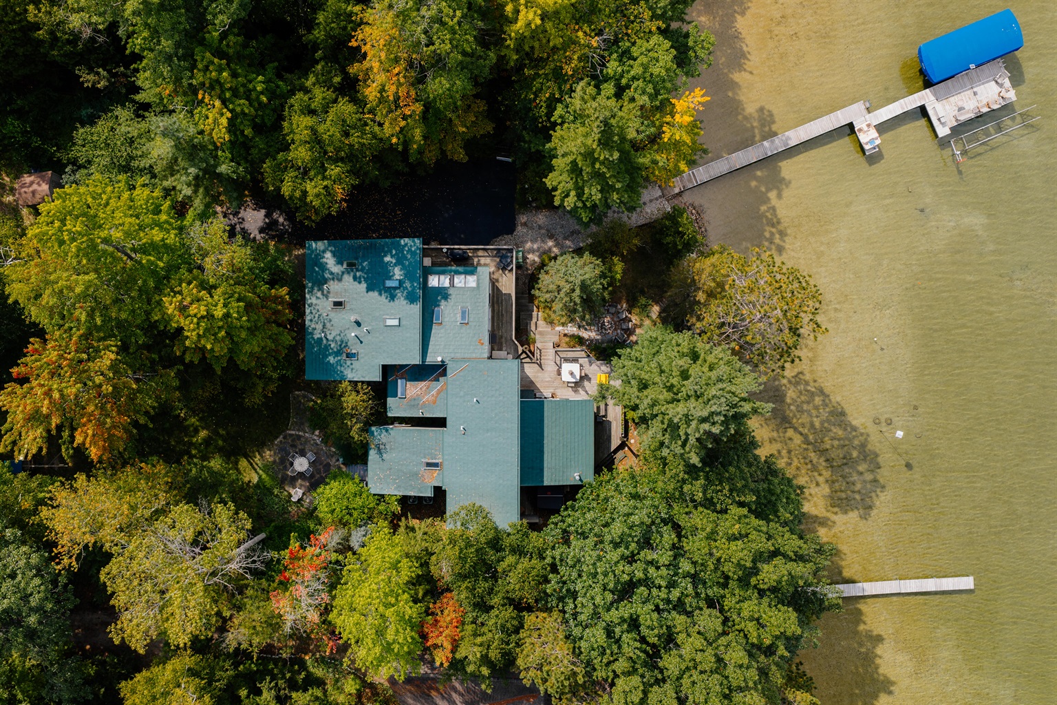 Aerial shot capturing the privacy and proximity to Long Lake.