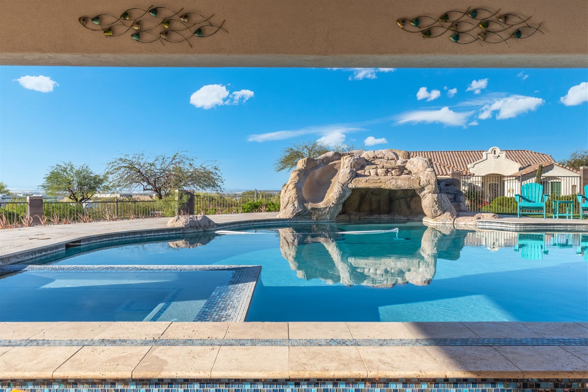 Sparkling pool and spa with panoramic mountain views provide the ultimate Arizona vacation centerpiece